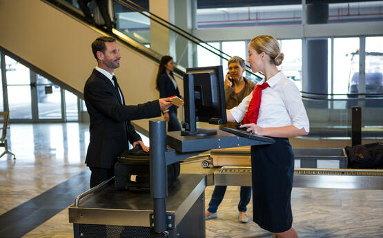 Pikwizard female staff interacting with passenger